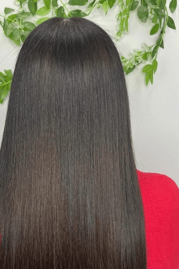 An image showing the back of a clients haiort after a brazilian blow dry service 