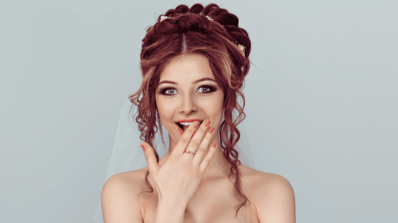 A smiling bride with elegant bridal hair styling, perfect for weddings and special occasions in Bexhill and East Sussex.